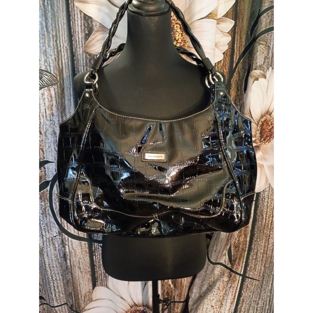 Sag Harbor patent leather large hobo bag features a crocodile embossed...